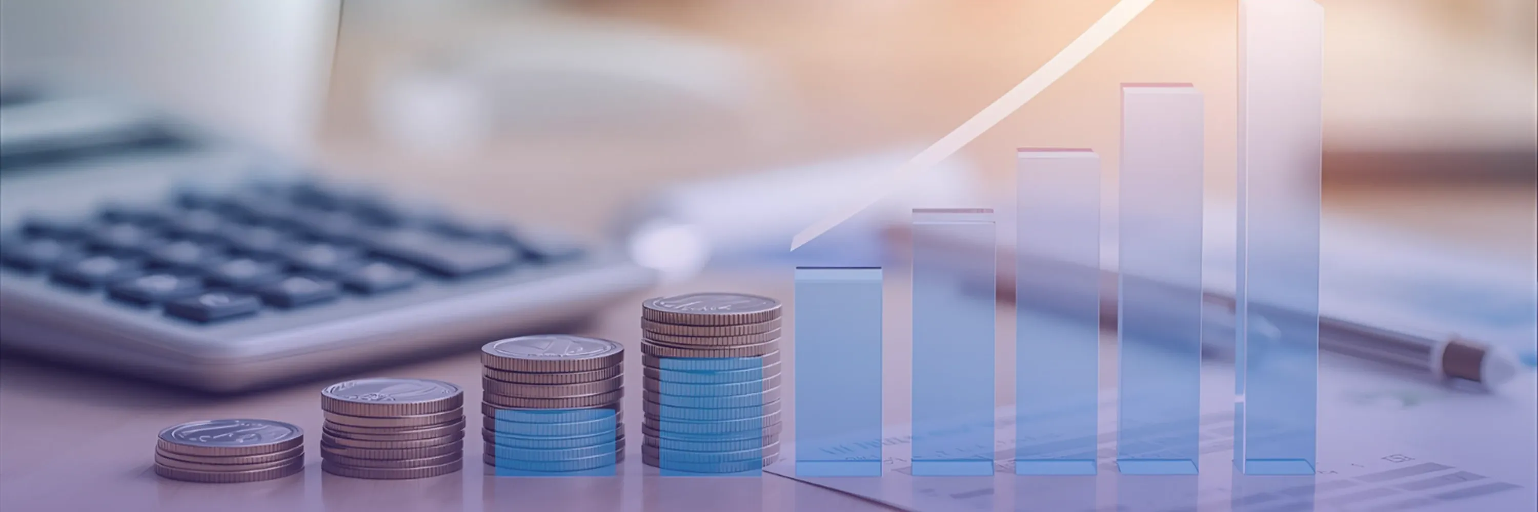 Stacked coins and rising bar charts on a desk with a calculator illustrate steady financial growth and positive business performance